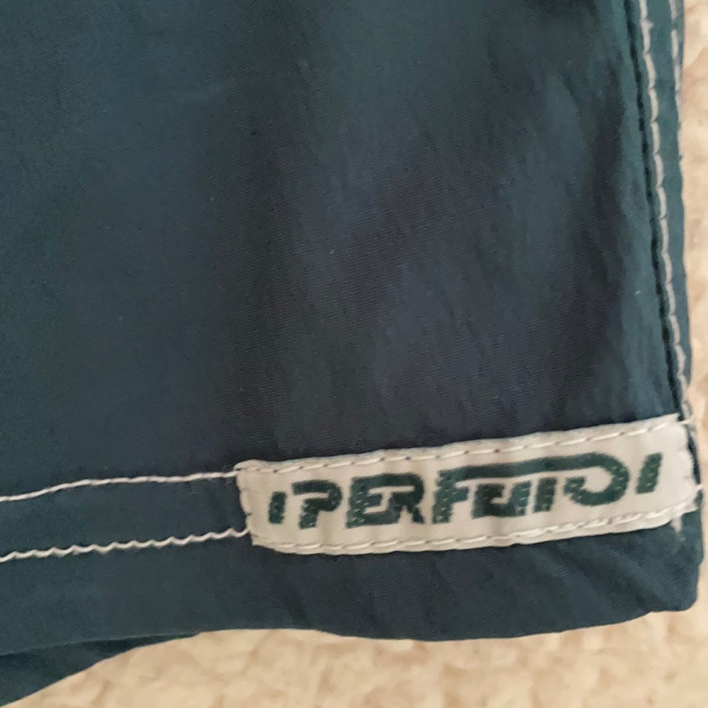 Like new board shorts teal and very light green